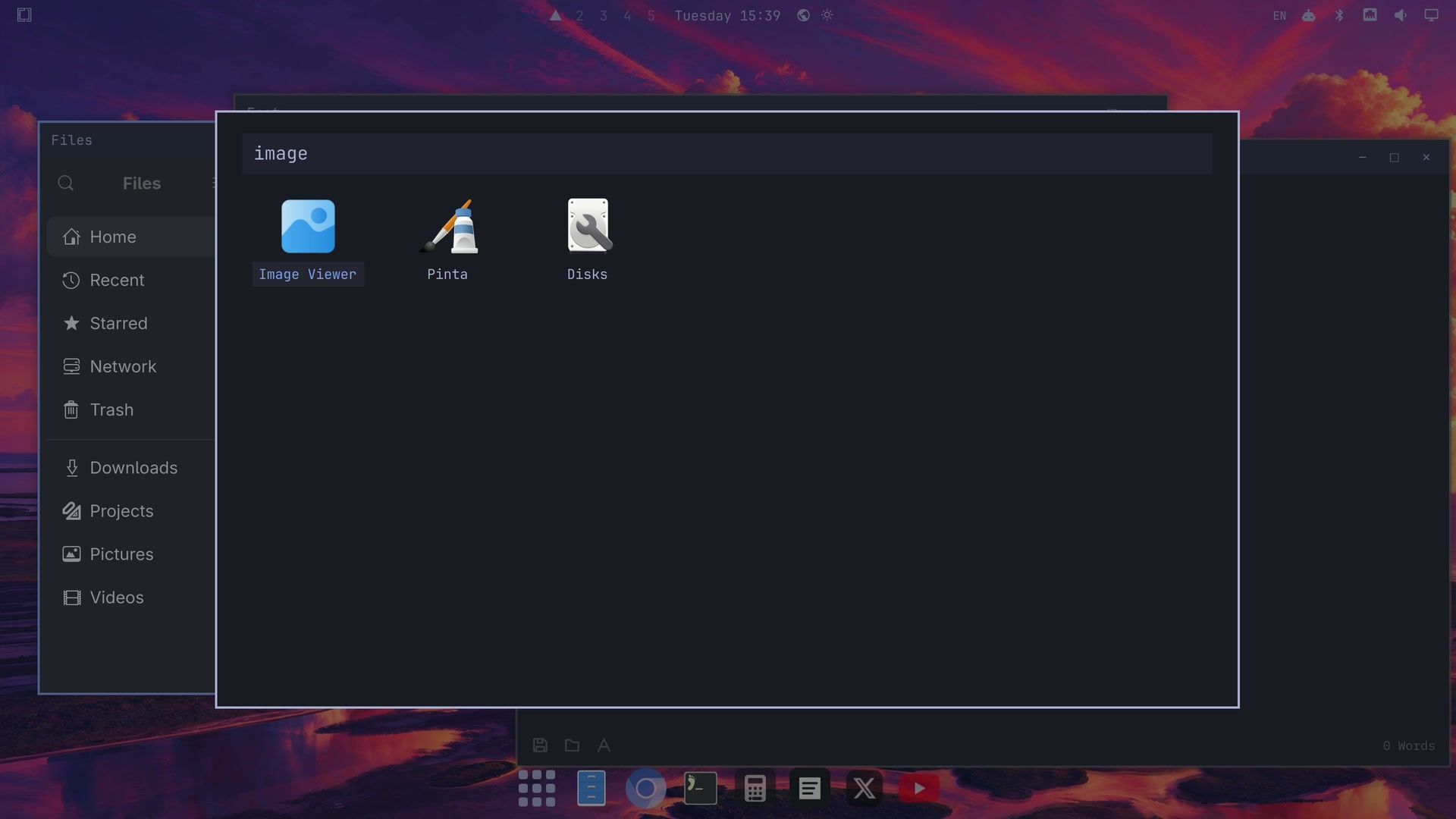 The Omarchy app grid filtered by the word image, showing Image Viewer, Pinta, and Disks, over a floating workspace